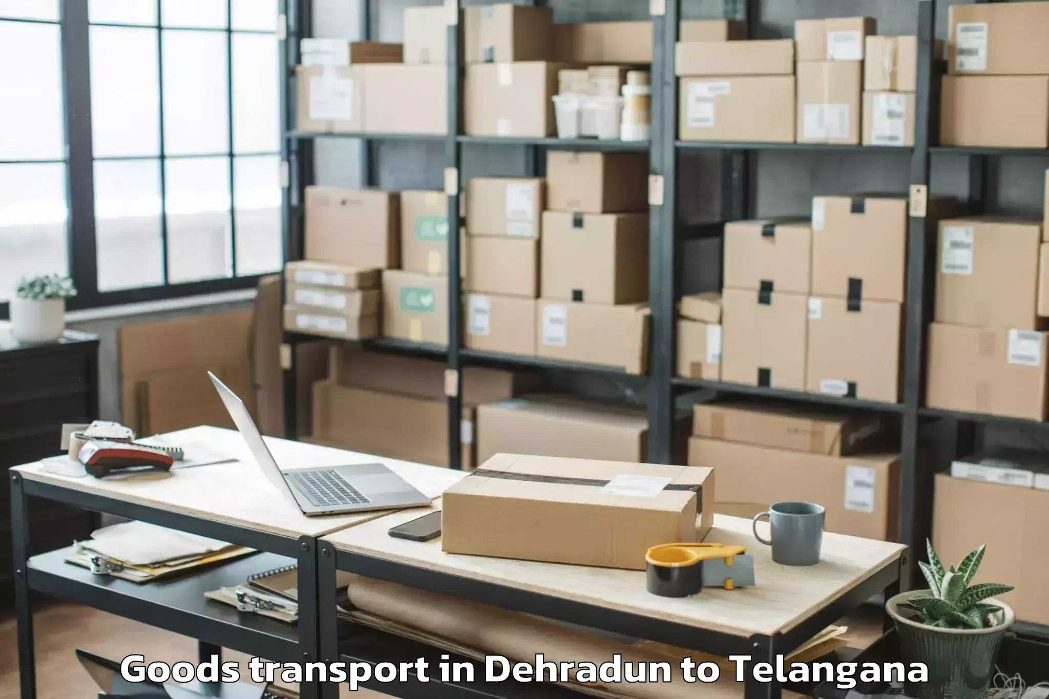 Professional Dehradun to Sircilla Goods Transport